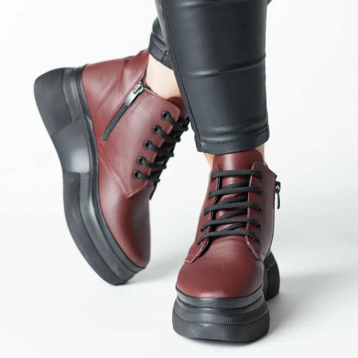 Women's burgundy ankle boots with zipper made of genuine Velora leather