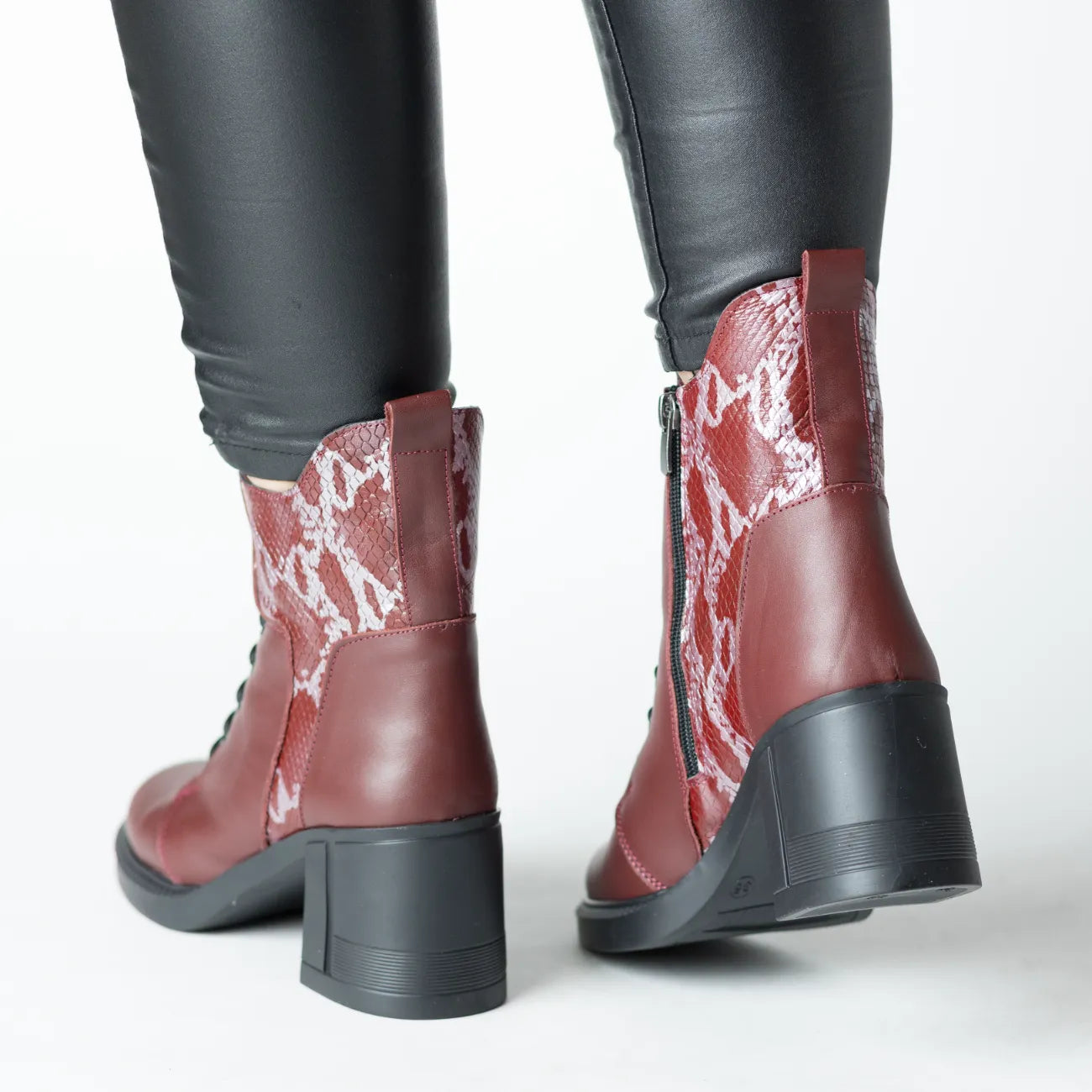 Women's burgundy heeled ankle boots made of printed natural leather Combat