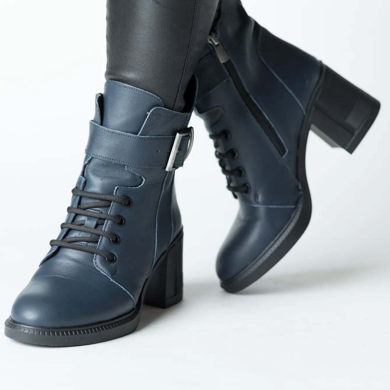 Navy blue heeled ankle boots with elastic front insert for women made of genuine leather Dalmatian